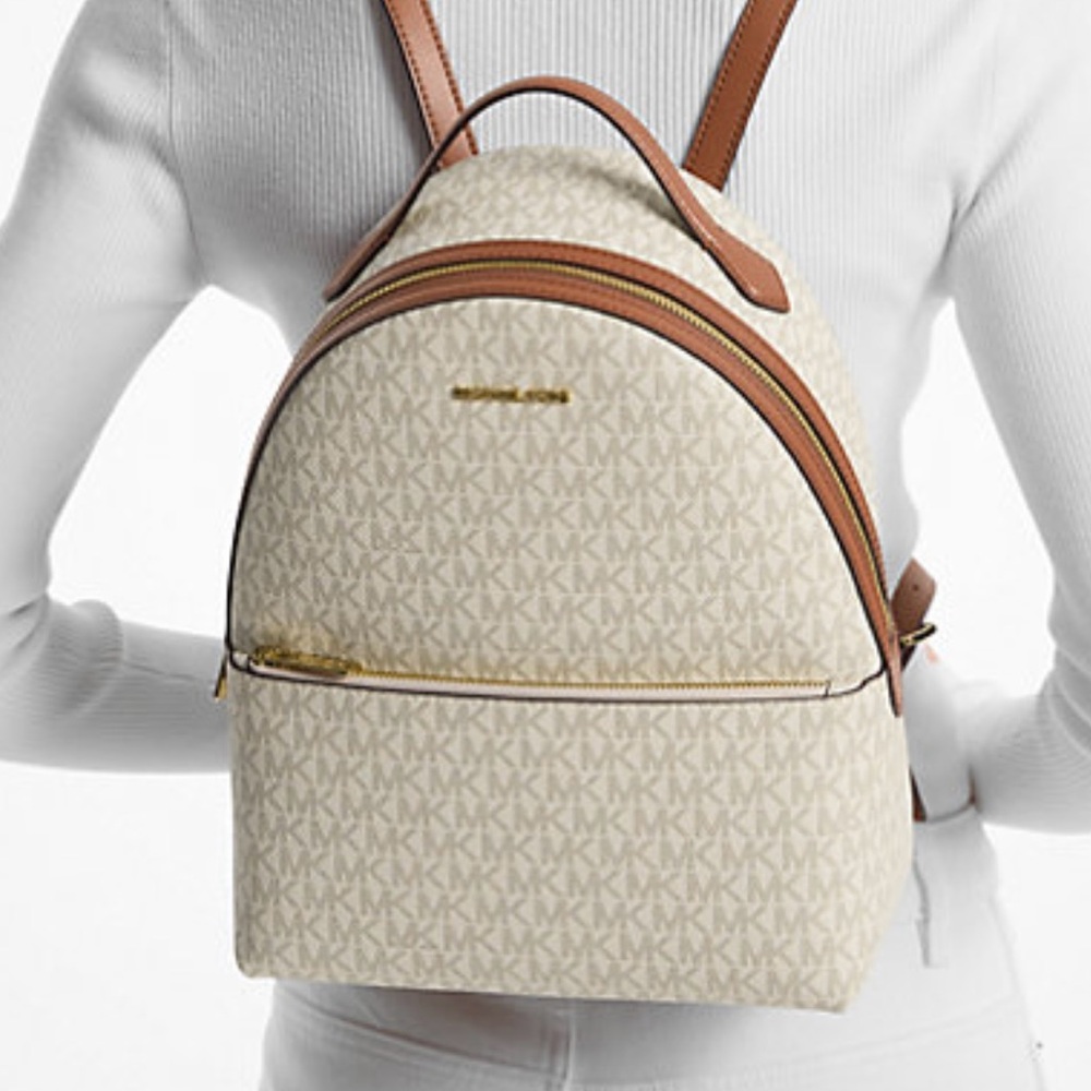 Michael Kors “Sheila Medium Logo Backpack”. In original unopened packaging.